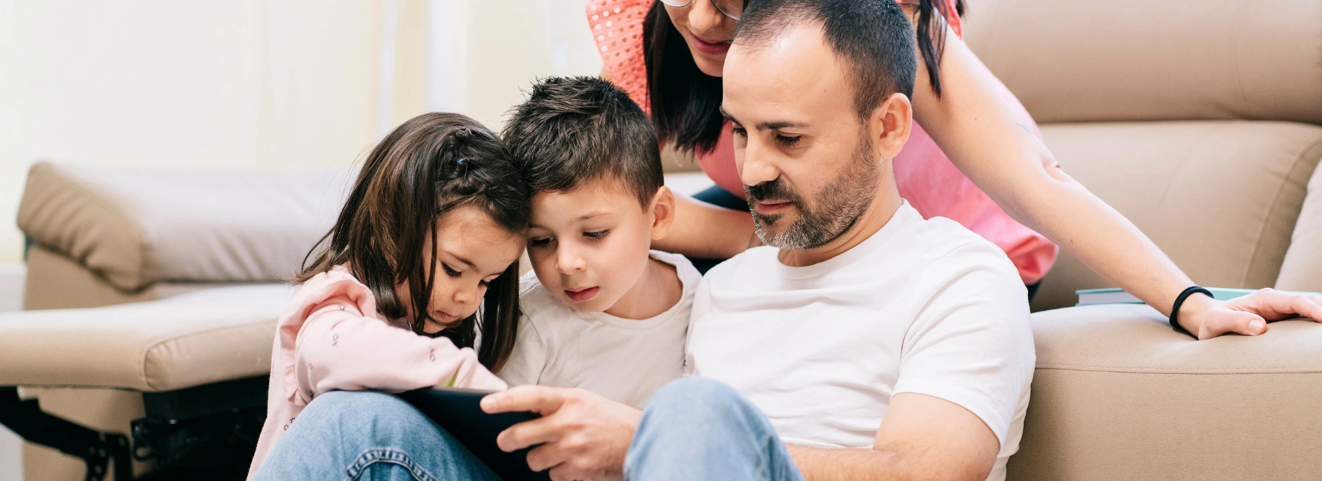 Happy family enjoying internet connection